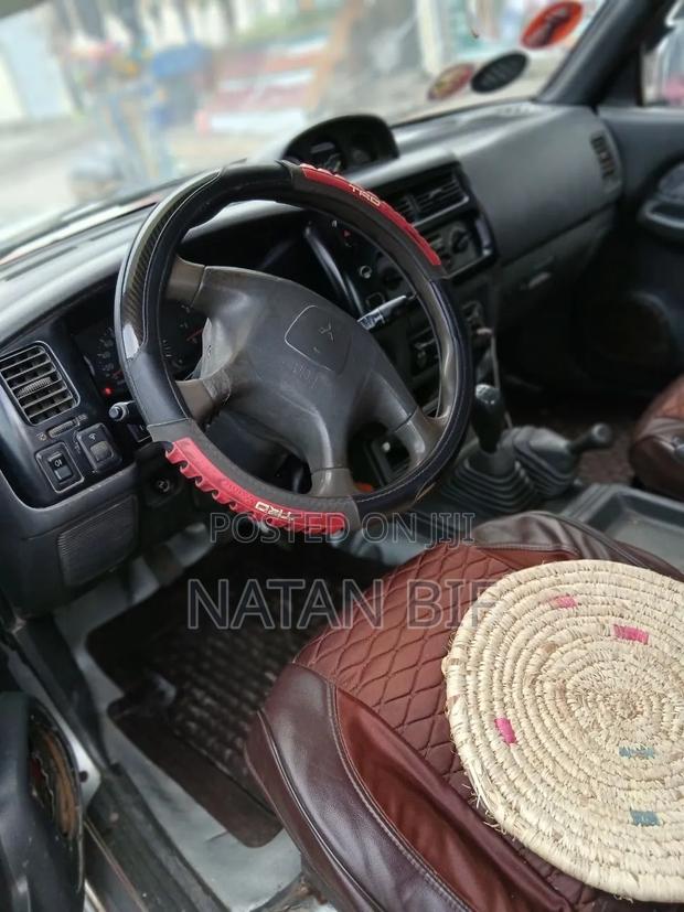 Mitsubishi L200 1999 Red