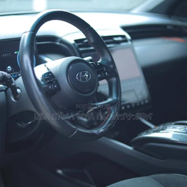 Hyundai Tucson Hybrid 2023 Maroon