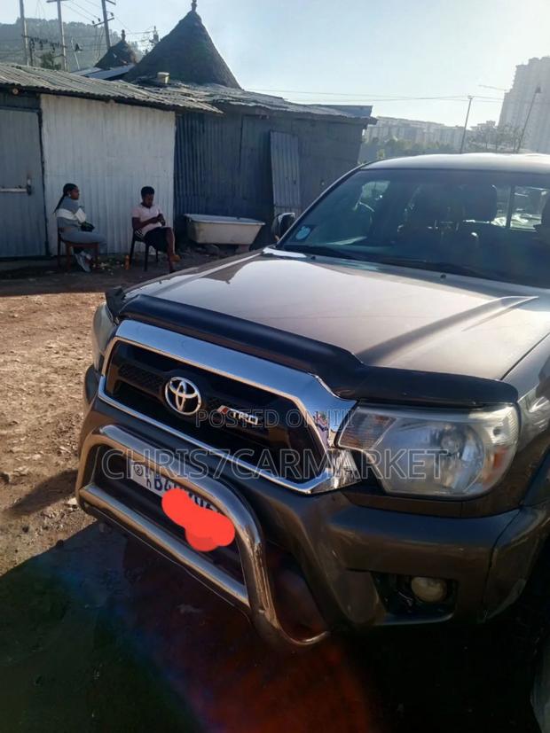 Toyota Tacoma 2dr Regular Cab 4WD 6.1 ft. SB (2.7L 4cyl 4A) 2014 Brown