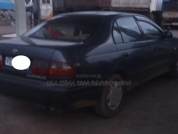 Toyota Carina E 1996 Maroon