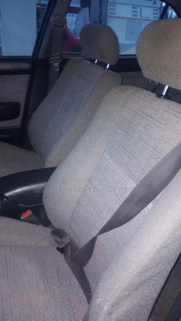 Toyota Carina E 1996 Maroon
