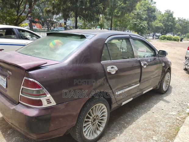 Toyota Corolla 2004 Burgundy