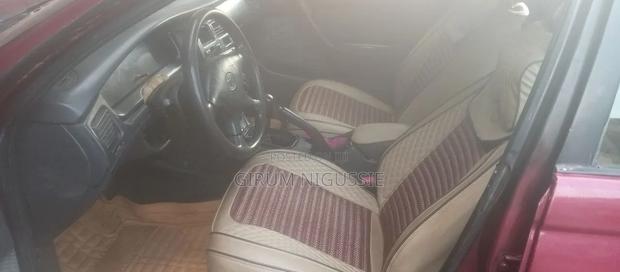 Toyota Carina E 1996 Burgundy