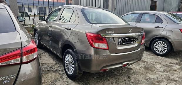 Suzuki Dzire 2024 Brown