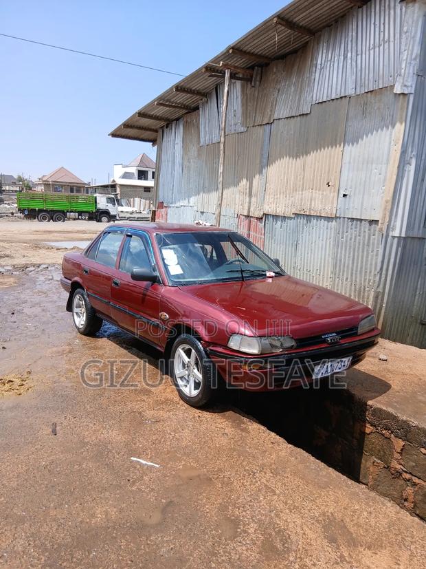 Toyota Corolla Sedan 1990 Burgundy