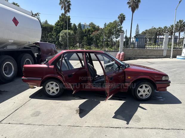 Toyota Corolla Sedan 1990 Maroon
