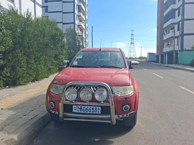 Mitsubishi L200 Club Cab 2.5 180hp 4WD 2009 Red