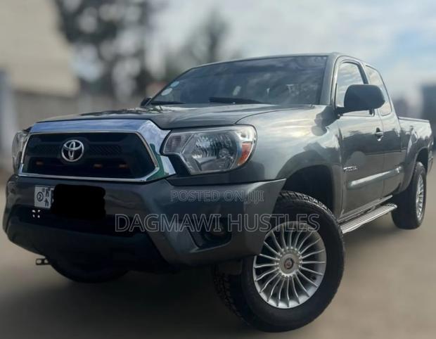 Toyota Tacoma Access Cab 4x4 2.7L 4-Cyl. 4-Speed Automatic 2013 Gold