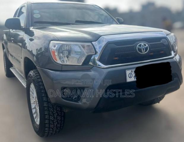 Toyota Tacoma Access Cab 4x4 2.7L 4-Cyl. 4-Speed Automatic 2013 Gold