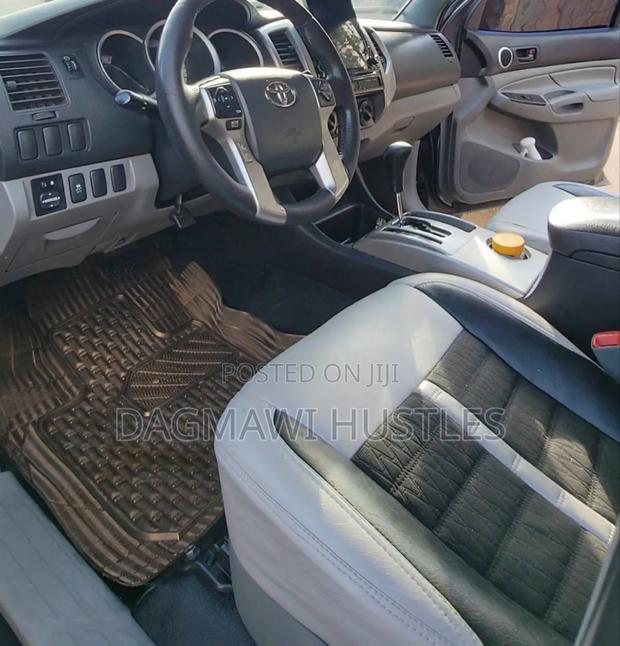 Toyota Tacoma Access Cab 4x4 2.7L 4-Cyl. 4-Speed Automatic 2013 Gold