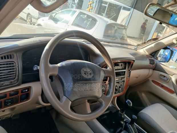 Toyota Land Cruiser 90 2002 Brown